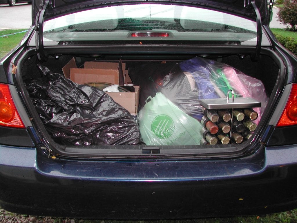 Car trunk full of bags of things to donate