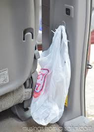 A garbage bag can be anywhere in the car, just make sure it is used.