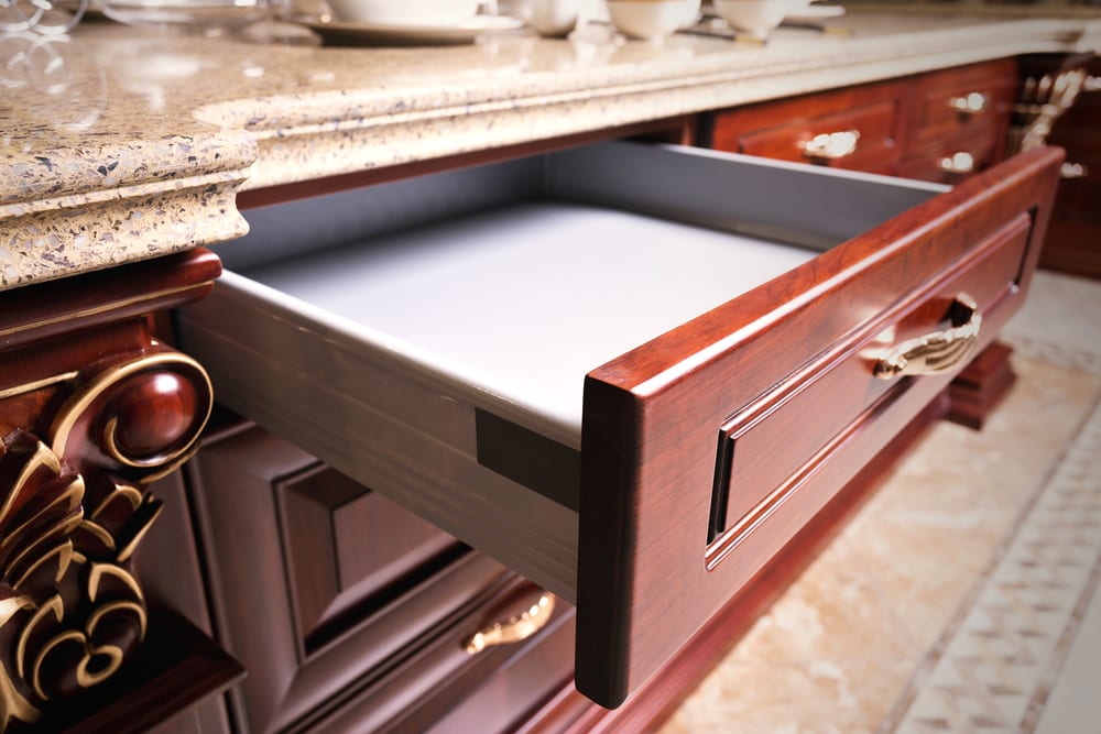 Use one drawer to store items that are handy to have close at hand, marker, tape, screwdriver