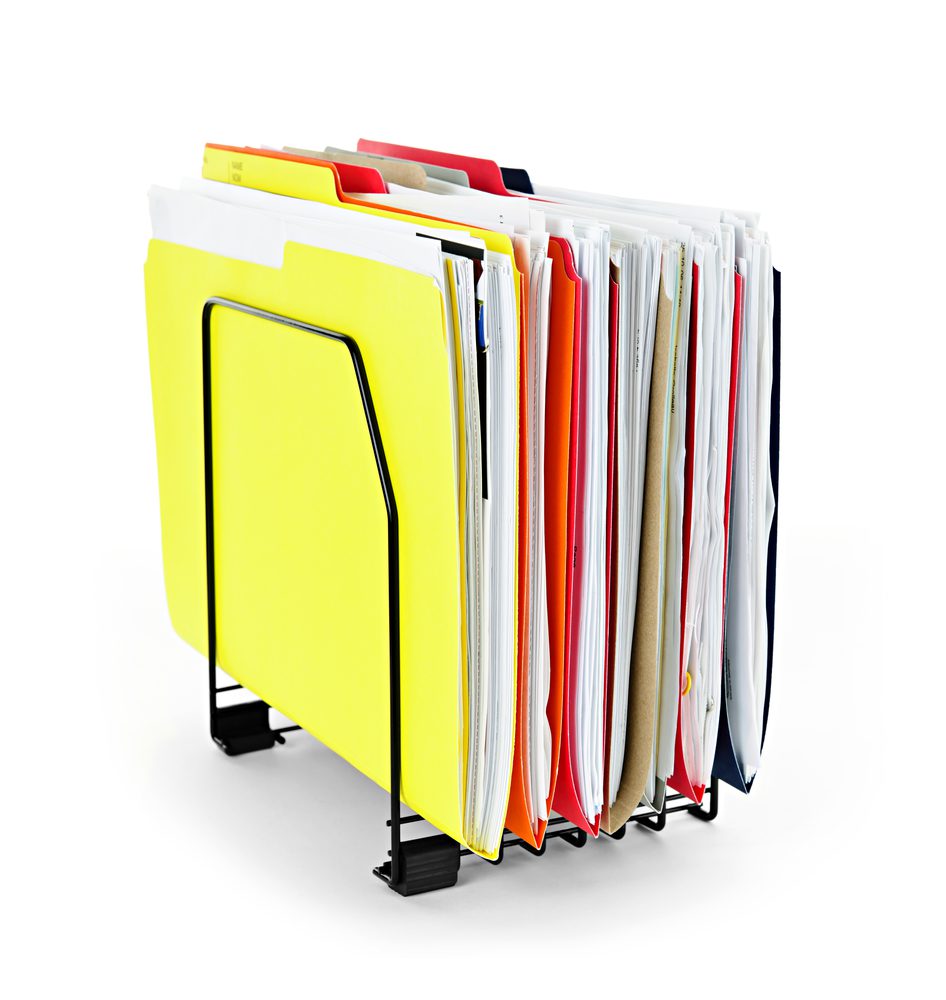 A rack of file folders of different colours 