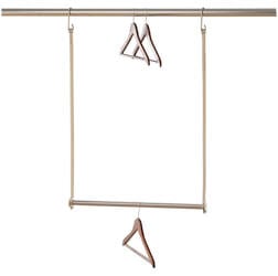 metal hanging bar with hangers on the main rod and the additional rod. 