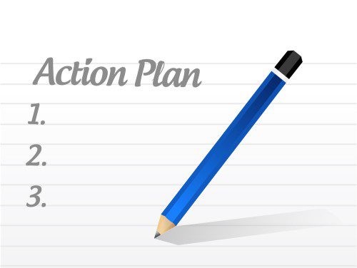 a pad of paper with the title Action Plan